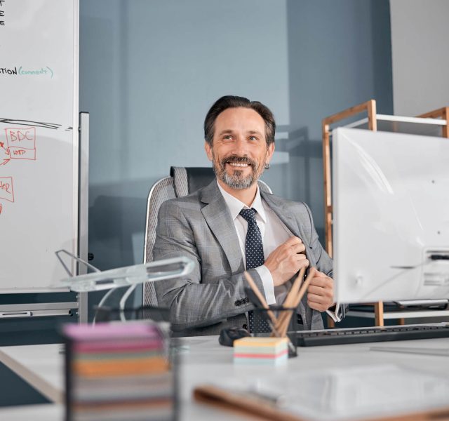 cheerful-businessman-in-gray-suit-working-in-moder-2021-09-03-14-19-38-utc.jpg